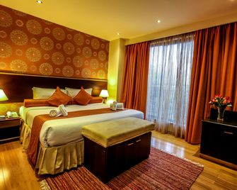 The Monarch Hotel - נאירובי - חדר שינה