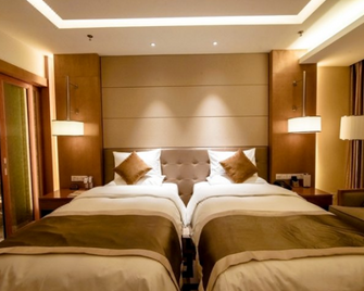 Kunlun Hotel - Panjin - Bedroom