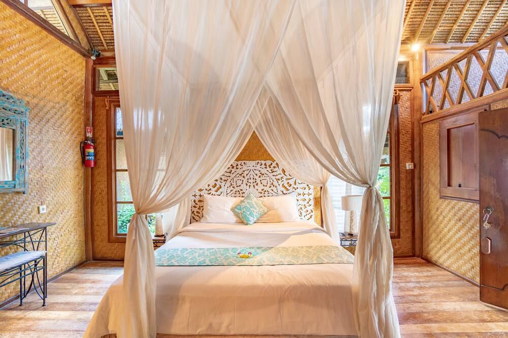 Santai Hotel - Abang - חדר שינה