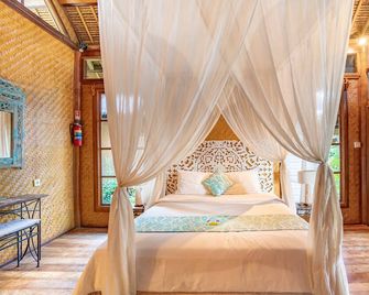 Santai Hotel - Abang - Habitación
