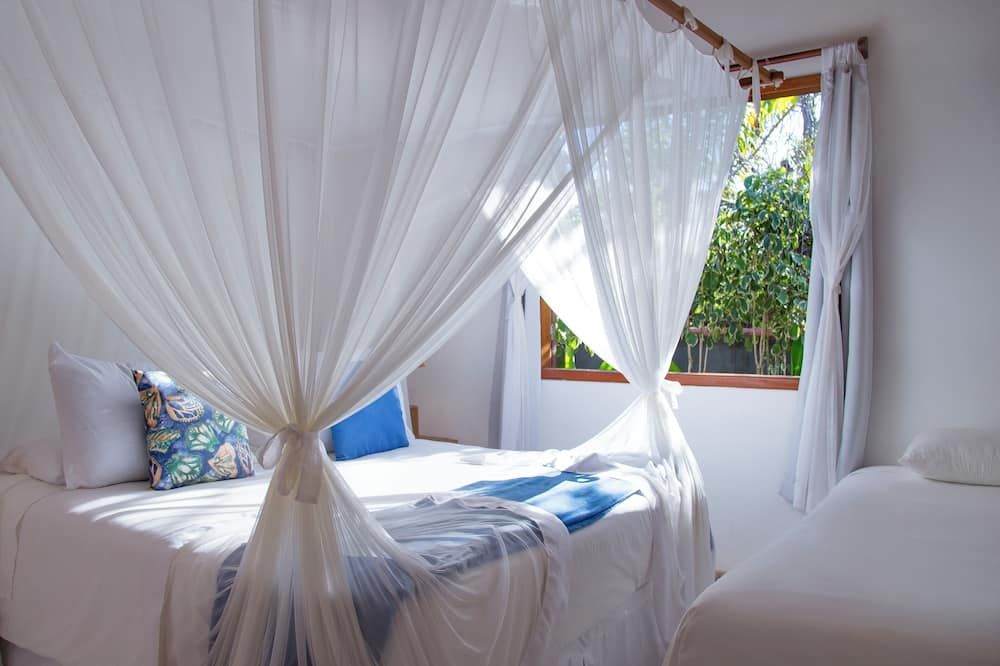 Pousada Suites Nativas - טרנקוסו - חדר שינה