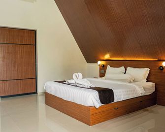 Kawaland Glamping Resort - Telukbakau - Schlafzimmer