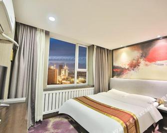 Changbai Four Seasons Hotel (Changchun Chongqing Road People's Square) - Changchun - Slaapkamer