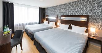 Hotel Munich Inn - Design Hotel - Munich - Bedroom