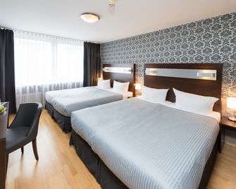 Hotel Munich Inn - Design Hotel - מינכן - חדר שינה