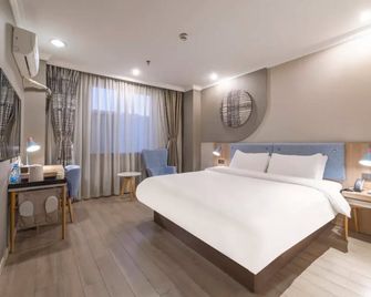 Home Inn Liuting - נינגבו - חדר שינה
