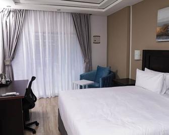 Olive Comfort Boutique Luxury Suites - Kwekwe - Habitación