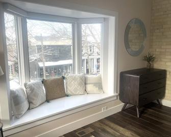 This studio apartment sits on the second floor perched over a retail shop. - Saugatuck - Living room