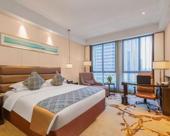 Purple Gold Hotel - Yancheng - Bedroom