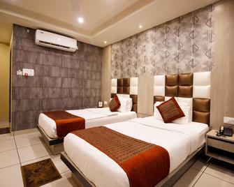 Hotel Galaxy Inn - Guwahati - Phòng ngủ