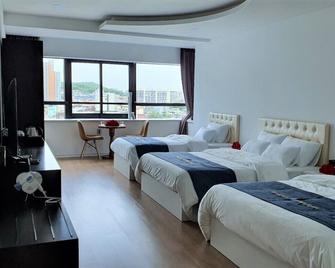 Hotel Wooin - Mokpo - Bedroom