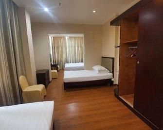 Haidian Resort Hotel - Beihai - Schlafzimmer