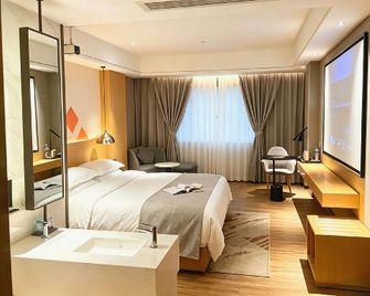 Borrman Hotel Huizhou Boluo Overseas Chinese School Tianhong Plaza - Huizhou - Спальня