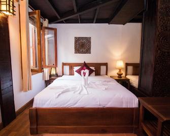 Royal Peacock Boutique Hotel - Luang Prabang - Schlafzimmer