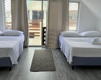 Crusoe Escape Villa - Crown Point - Habitación