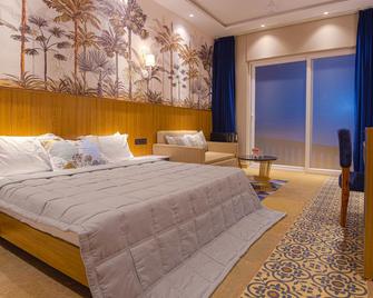 Eutopia Beach Resort, Morjim - Morjim - Bedroom