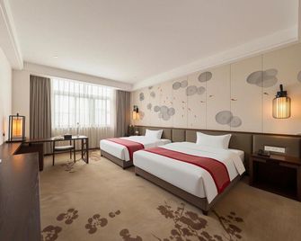 Hakkas Center Hotel - Mej-čou - Ložnice