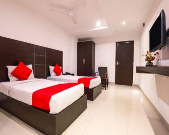 Collection O Thyag Inn - Vijayawada - Habitación