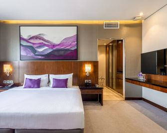 Flora Al Barsha Hotel At The Mall - דובאי - חדר שינה