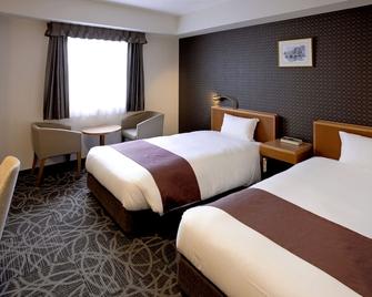 Yaoji Hakata Hotel - Fukuoka - Bedroom