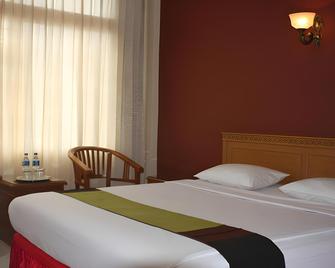 Lintas Sumatra Hotel - Lubuklinggau - Bedroom