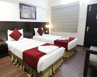 إيه إن آر هوتلز - لكناو - غرفة نوم