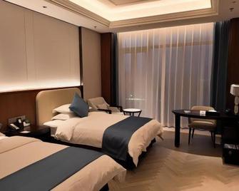 Yancheng Guest Hotel - Yancheng - Bedroom