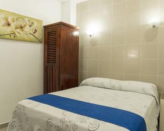 Micro Hotel Express - San Pedro Sula - Bedroom