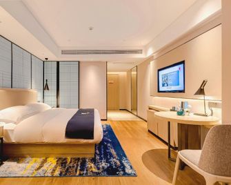 Echarm Hotel Jingmen Intime City - Jingmen - Habitación