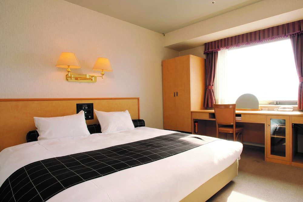 Yamagata Kokusai Hotel - Yamagata - Camera da letto
