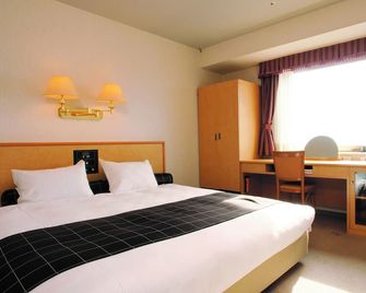 Yamagata Kokusai Hotel - Yamagata - Schlafzimmer