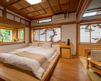 Furuyu Onsen Kakureisen - Saga - Bedroom