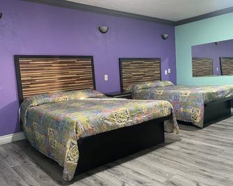 Economy Inn - Lynwood - Bedroom