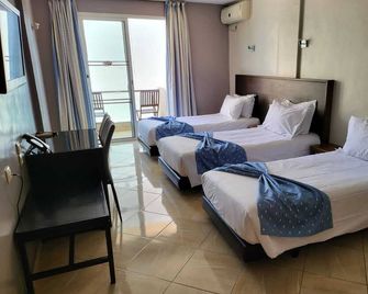Résidence Hotelière Fleurie - Agadir - Κρεβατοκάμαρα