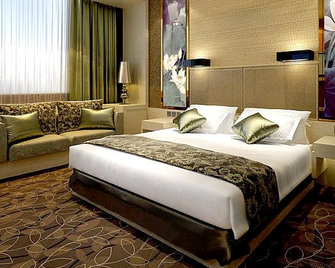 Junyue Shiyuan Hotel - ז'ינאן - חדר שינה