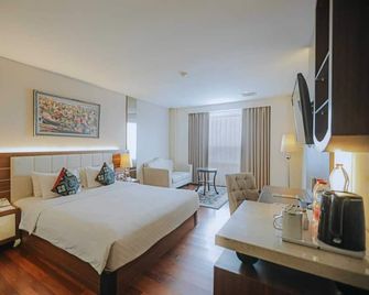 Grand Qin Hotel Syariah - Banjarbaru - Schlafzimmer