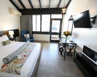 Econo Lodge Hacienda International - Sale - Bedroom