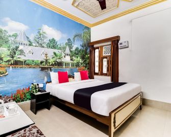 Capital O Kanha Hotel And Restraunts - Sītāpur Mūāfi - Bedroom