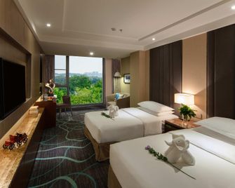 Venus Royal Hotel (Guilin Elephant Trunk Hill Sun and Moon Twin Towers) - Guilin - Habitación
