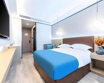 Gya Hotel Wuxi Hubin Commercial Street Tai Lake Scenic Area - Wuxi - Schlafzimmer