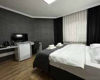 Özdemir Inn Otel - Balikesir - Bedroom