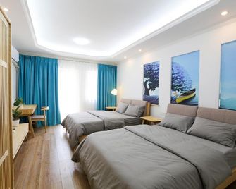 Longhai Kada Kaisi Cape No 1 Holiday Apartment - Xiamen - Bedroom