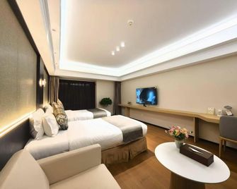 Yangyang International Hotel - Xi'an - Bedroom