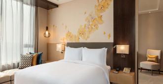 Hilton Garden Inn Dandong - Dandong - Schlafzimmer