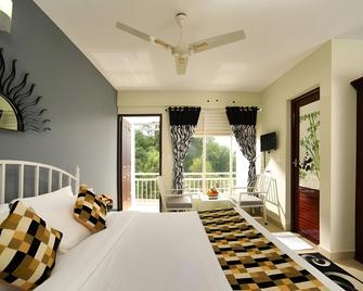 The Whispering Meadows Resort - Munnar - Habitación