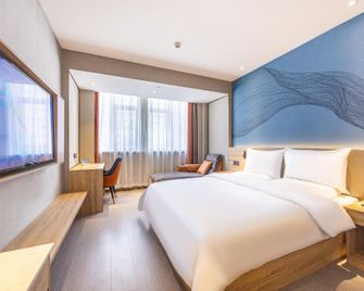 Starway Hotel (Linxia Yiwu International Commercial Plaza) - Linxia - Bedroom