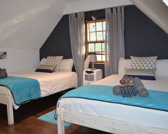 سوفيجنون كانتري لودج - ولينغتون (ساوث أفريكا) - غرفة نوم