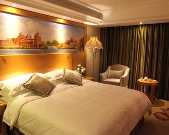Vienna International Hotel Beijing Guanganmen - Pekín - Habitación