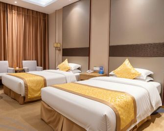 Fusheng Hotel (Qingdao Huangdao) - Qingdao - Bedroom