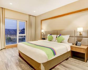 Treebo Trend Radhe Palace - Kalkata - Ložnice